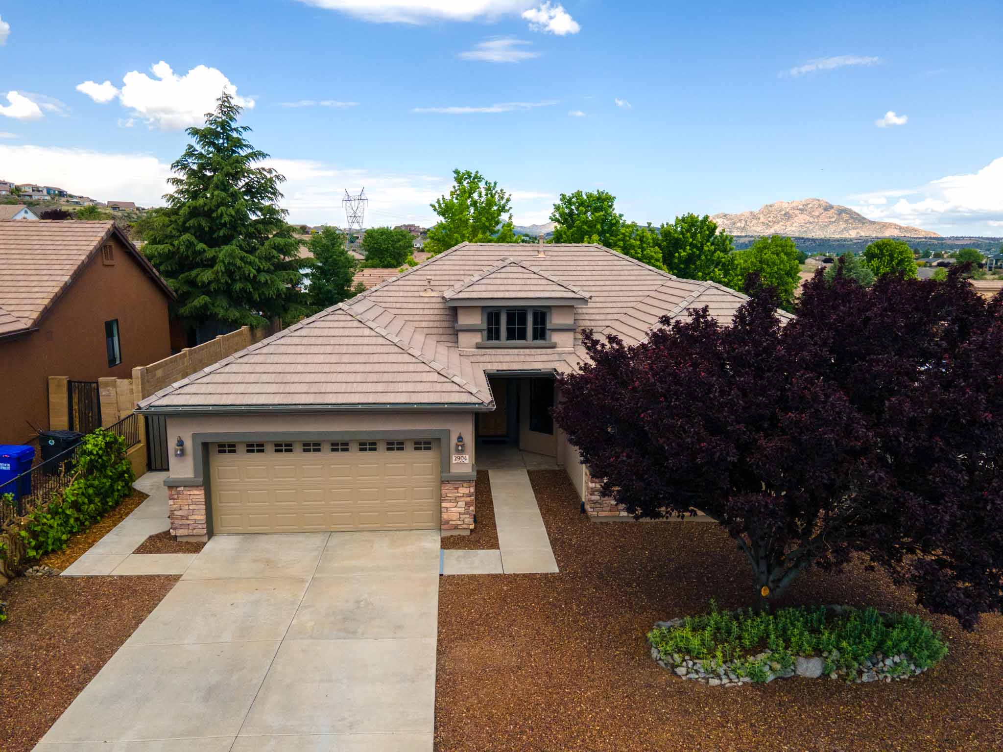 drone photo of a home in Arizona with a tree